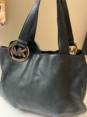 Michael Kors Black Leather Tote with Gold MK Medallions